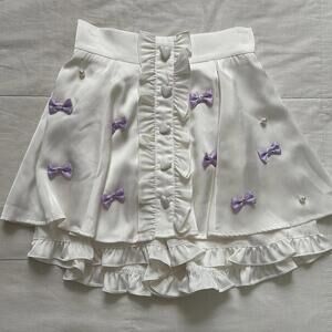 Ank Rouge White skirt with purple bows and pearls size small